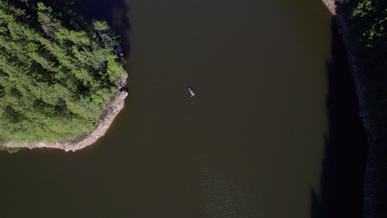 Kayaking on a Mountain Lake, Top View with Boat Tracking