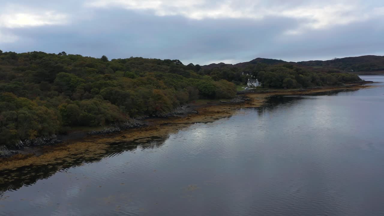 Drone Establisher of Scottish Highlands Arisaig Village rural location next to Lake, Seagull flying landscape