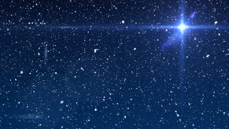 animation of snow falling over glowing star on blue sky