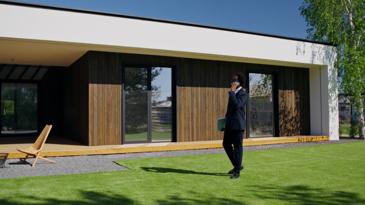 Real Estate Agent Discussing Property