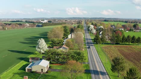 Aerial-tracking-shot-above-road-in-USA