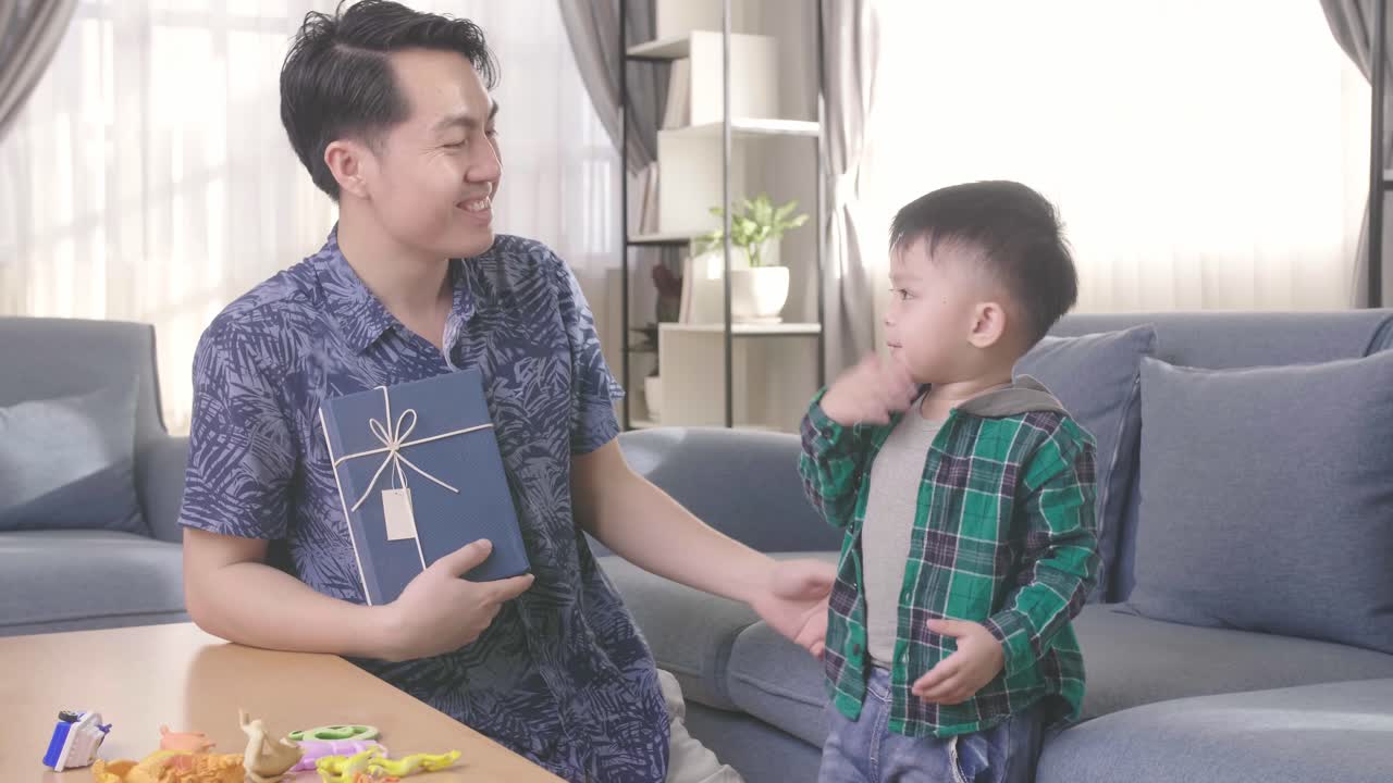 Father'S Day, Asian Son Kiss His Father Holding Gift