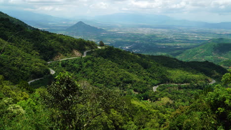 static shot of winding road in mountain