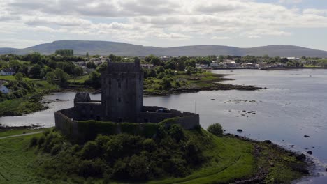 Calm-orbiting-shot-of-Dunguaire-Castle