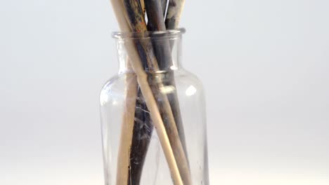 Various-paintbrush-in-glass-container