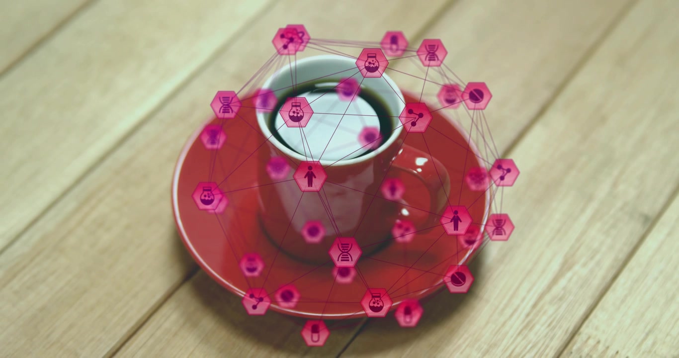 Después de un segundo, nodos 3D aparecen alrededor de una taza de café roja, conectándose y pulsando para mostrar el flujo de datos.