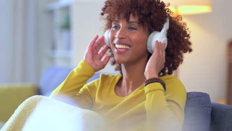 woman listening to music on headphones
