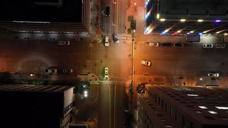 intersection in davenport, iowa at night with drone video overhead looking down and moving down