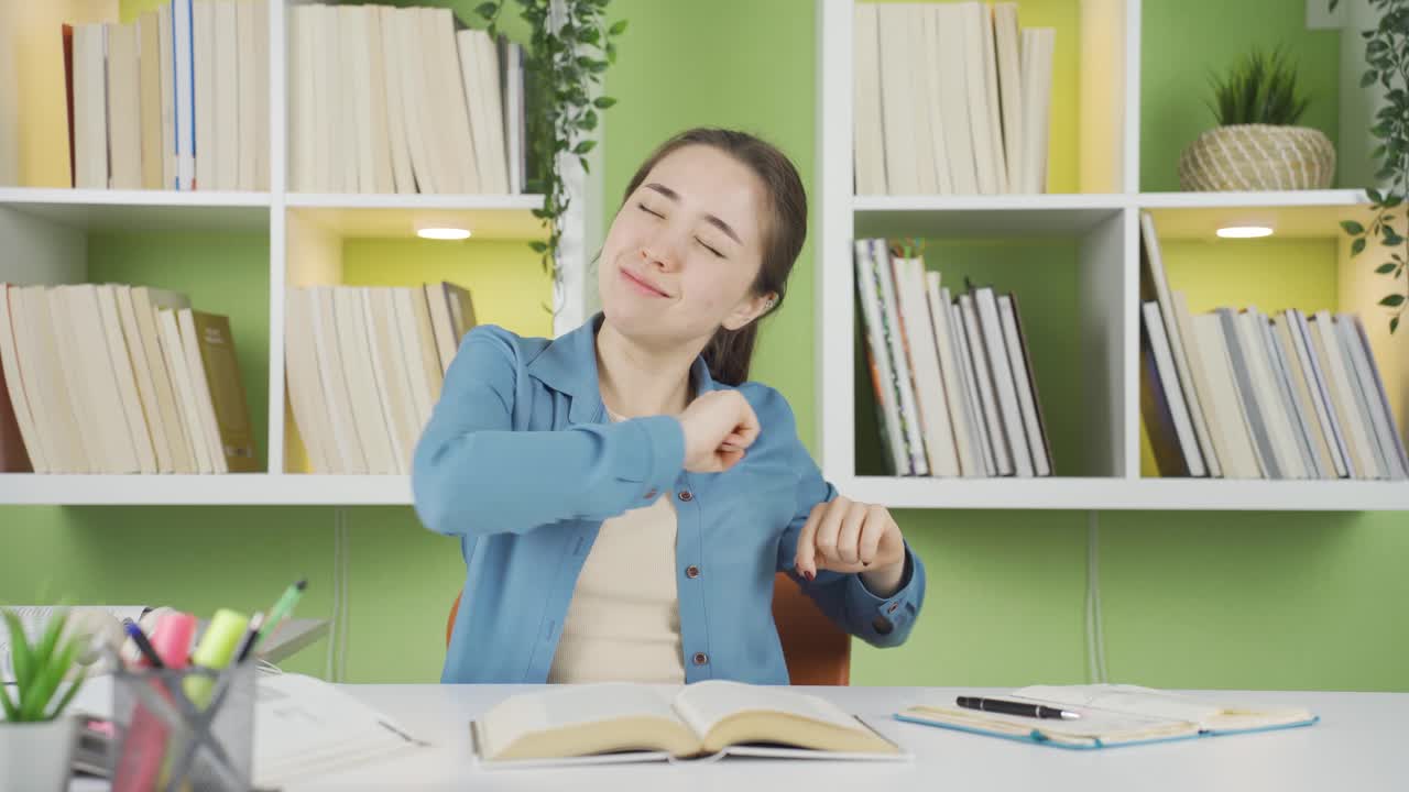 Asian schoolgirl relaxing and yawning.