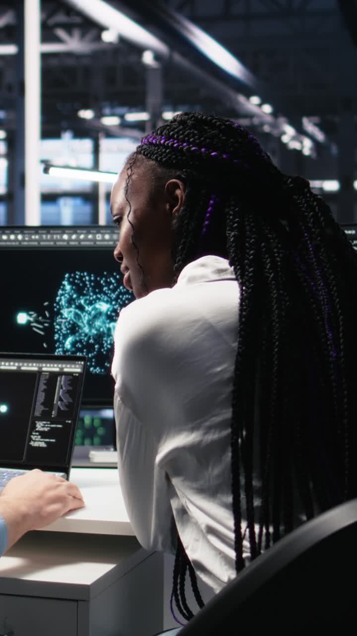 Vertical video Teamworking data center technicians using machine learning algorithms