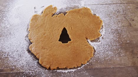 raw cookie dough with christmas tree shaped hole 4k