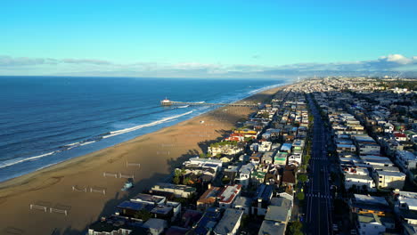 Aerial-panoramic-Manhattan-beach-city-landscape-blue-sea-waves-USA-travel-destination,-calm-morning-sunny-skyline