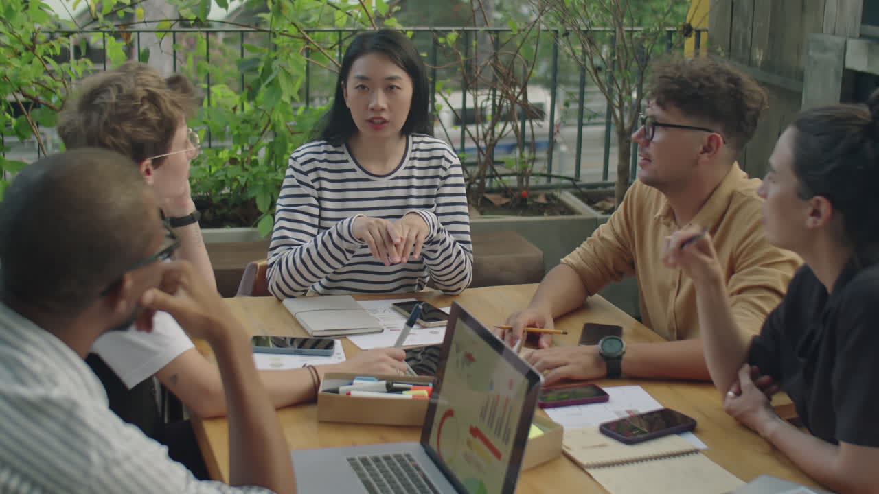 Team Meeting Around a Table