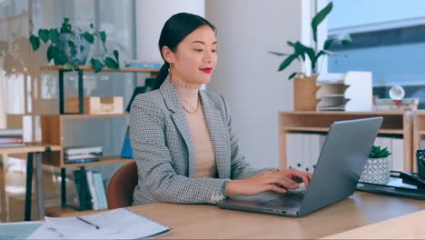 laptop, typing and asian business woman in office