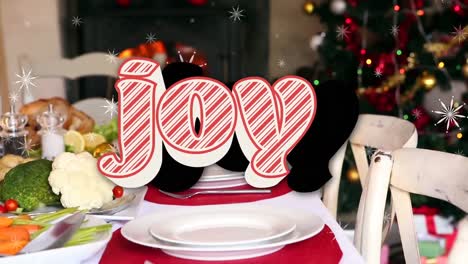 animación de texto de alegría sobre la mesa de la cena de navidad y el árbol de navidad.