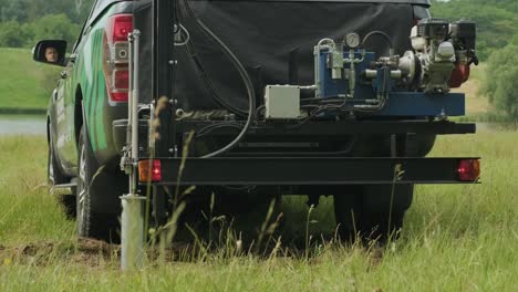 soil examination of agronomy. geotechnical investigation. collecting black soil on the field for examination and analysis. special equipment for pickup