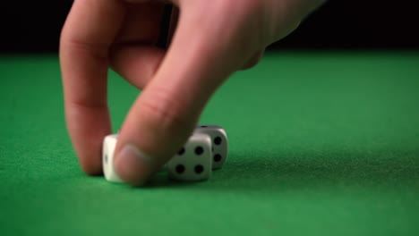 picking and grabbing dice from the game table