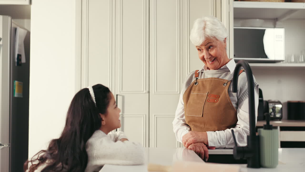Grandmother and Grandchild Playing Together in the Kitchen