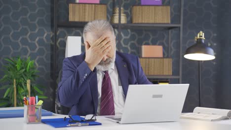 sleepy businessman yawns looking at camera.