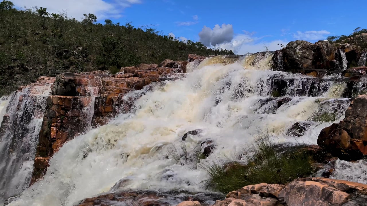 Waterfall at Cataratas dos Couros in Chapada dos Veadeiros National Park, Goiás, Brazil, a protected UNESCO area known for quartzite geology and cerrado biodiversity.