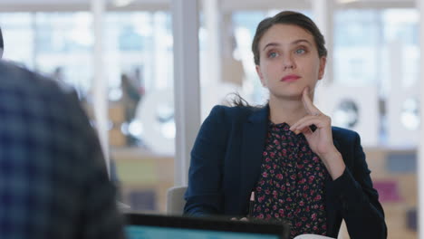 beautiful business woman asking question in boardroom meeting with colleagues sharing ideas in office 4k