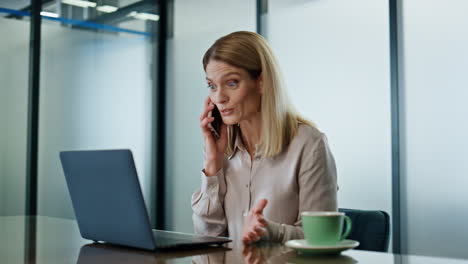 positive director making call office. excited winner lady reacting emotionally