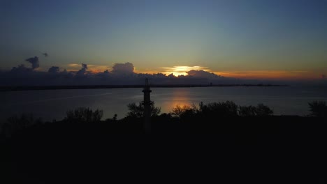 Overflying-Isla-de-Sacrificios-revealing-Veracruz-and-Boca-del-Rio-City-at-sunset