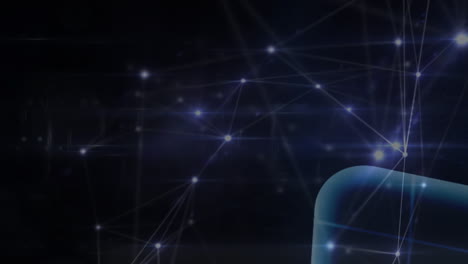 animation of glowing blue network of connections against light spot on black background