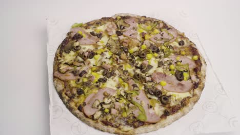 pizzra rotating in slow motion with zoom out effect