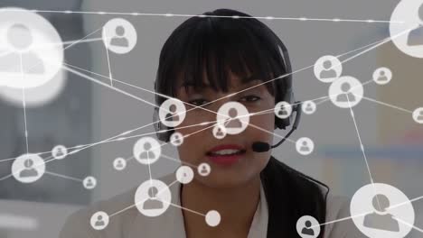 Animation-of-network-of-connections-and-icons-over-businesswoman-wearing-headset