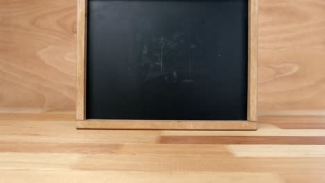 blank chalkboard on a table