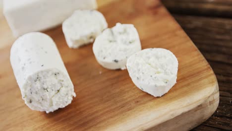 slices of cheese on wooden board