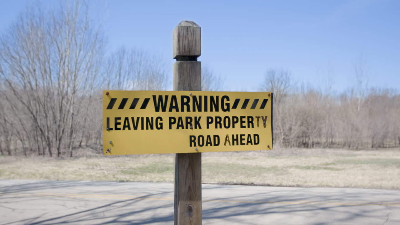 Warning Leaving Park Property Sign Panning Slowly