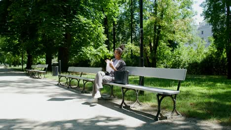 businesswoman relaxing in a park