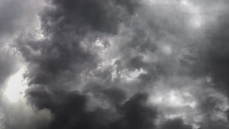 thunderstorm with lightning bolt strikes in dark clouds