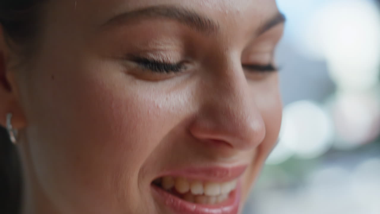 Closeup woman face smiling to unknown person. Portrait happy girl