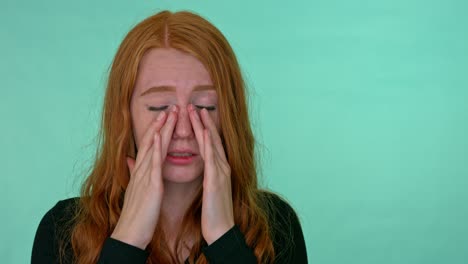 young woman pressing skin on her nose because of feeling pain