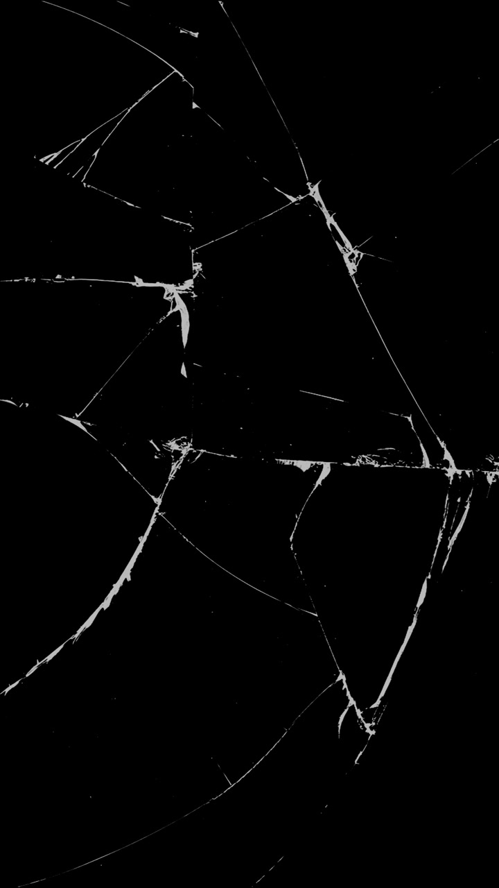 A detailed, complex pattern of cracks on shattered glass. A static vertical overlay for themes of severe damage, accidents, or destruction