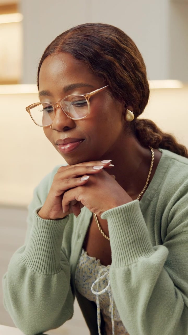 Focused Young Woman Working at Her Desk