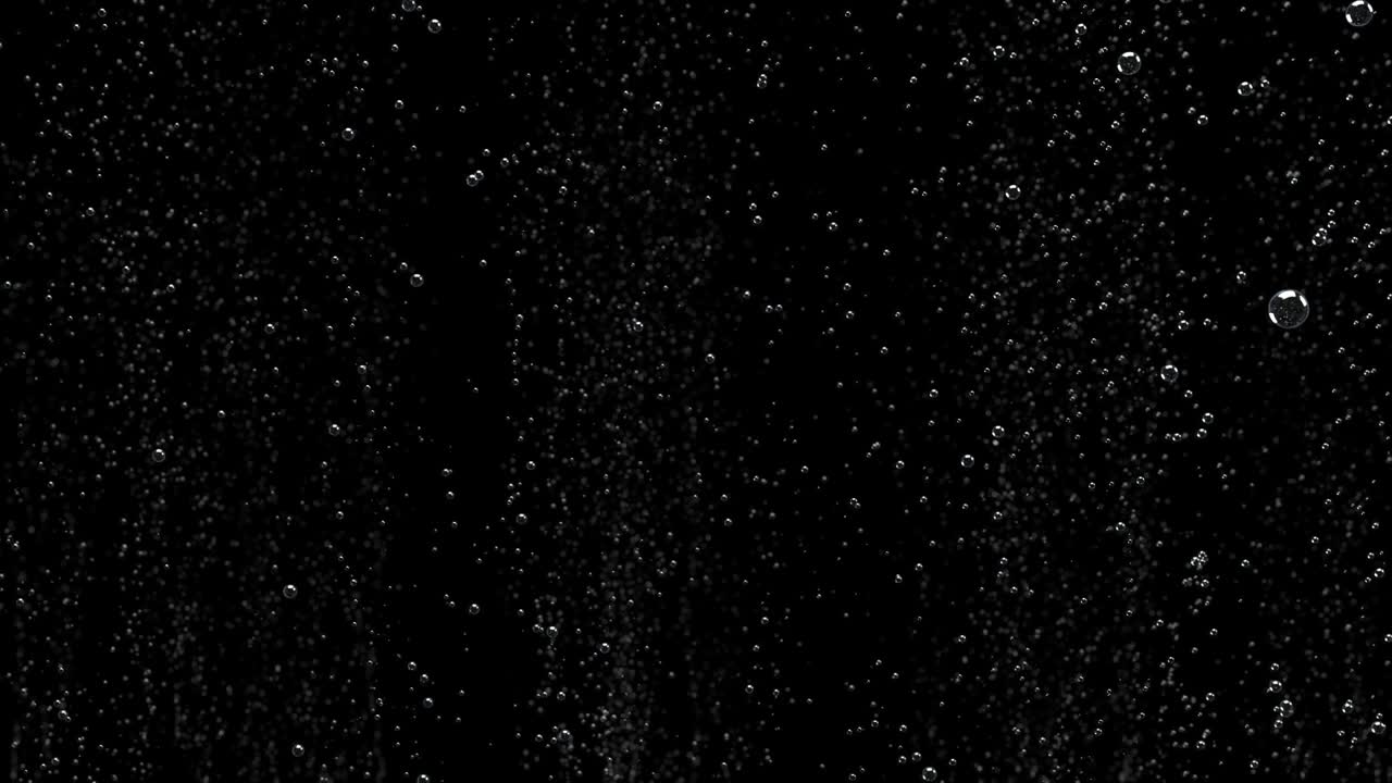 물 표면에 떠있는 물 에 있는 공기 거품의 근접 사진