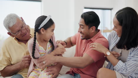 happy, tickling and child with parents