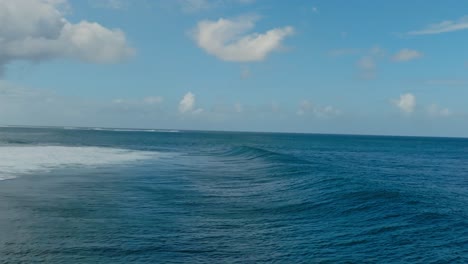 small waves breaking on a shallow reef in mauritius