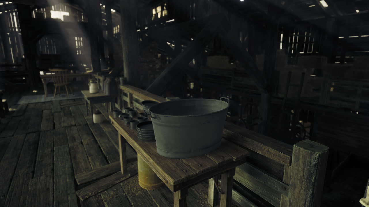 Rustic interior of an old barn showcasing wooden beams and vintage tools