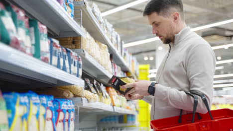 man shopping for groceries in a supermarket