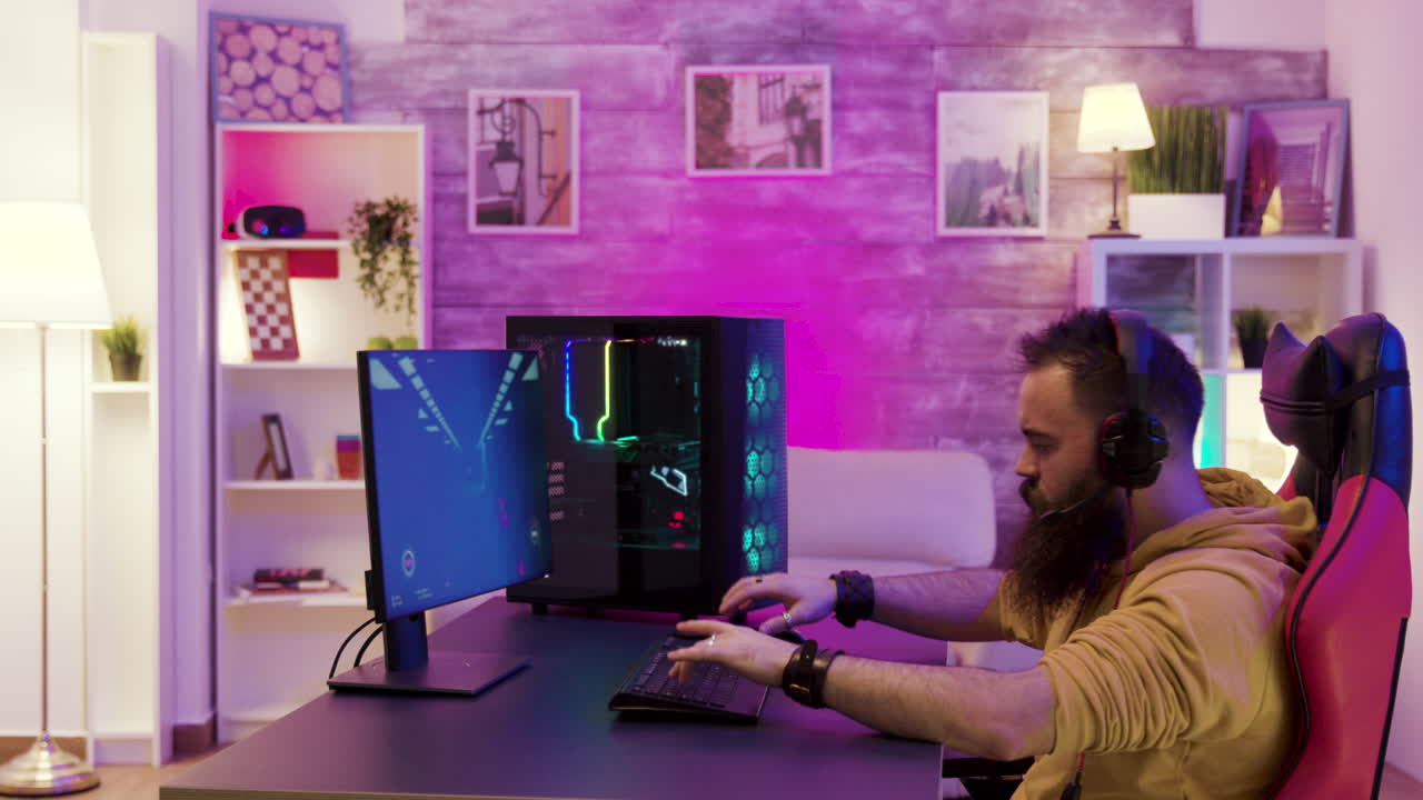 Gamer playing video games on his high end pc