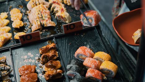 raw fish sushi being sold at market