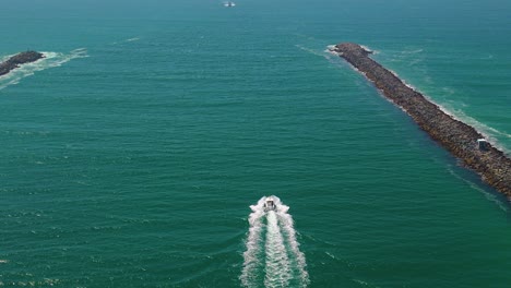 speedboat heading to the sea from mission bay in san diego, california, usa