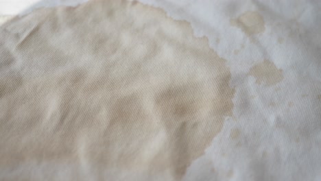 coffee stain on a white t-shirt