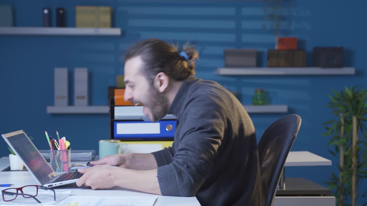 Successful businessman is experiencing joy.