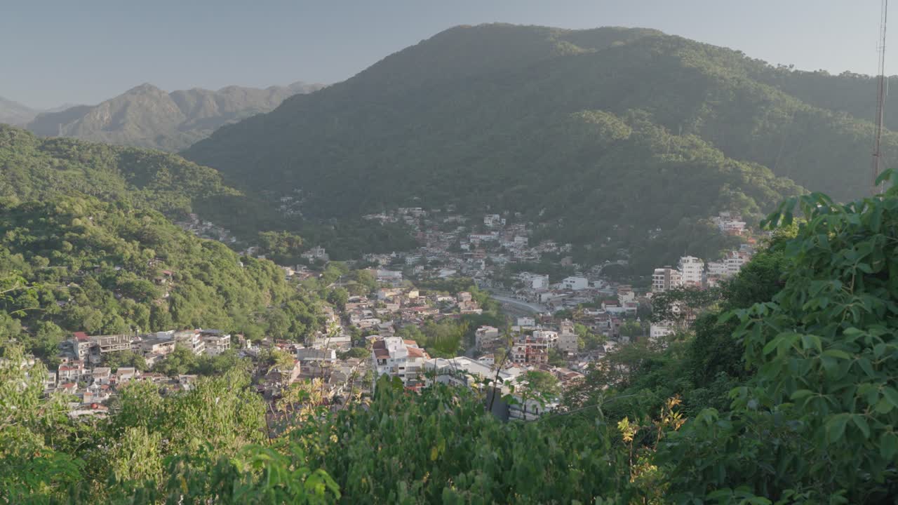 Town nestled in a valley surrounded by mountains